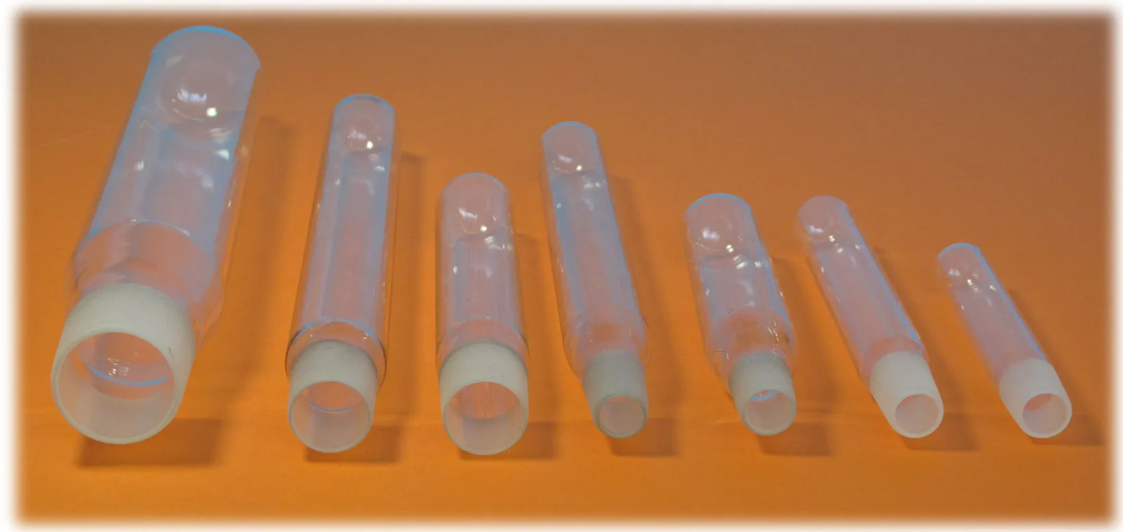 Boron-silicate glass reaction vessels for benzene line